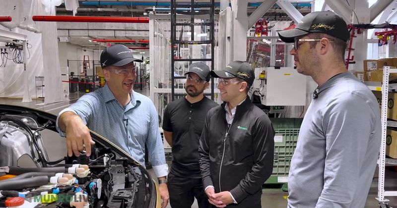 Tesla's Optimus will plug in Robotaxis at Superchargers, executives say